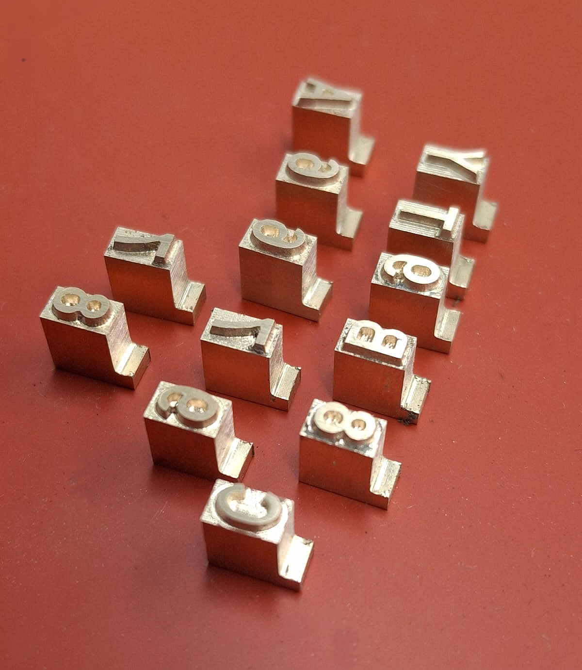 Cuños y portacuños de bronce